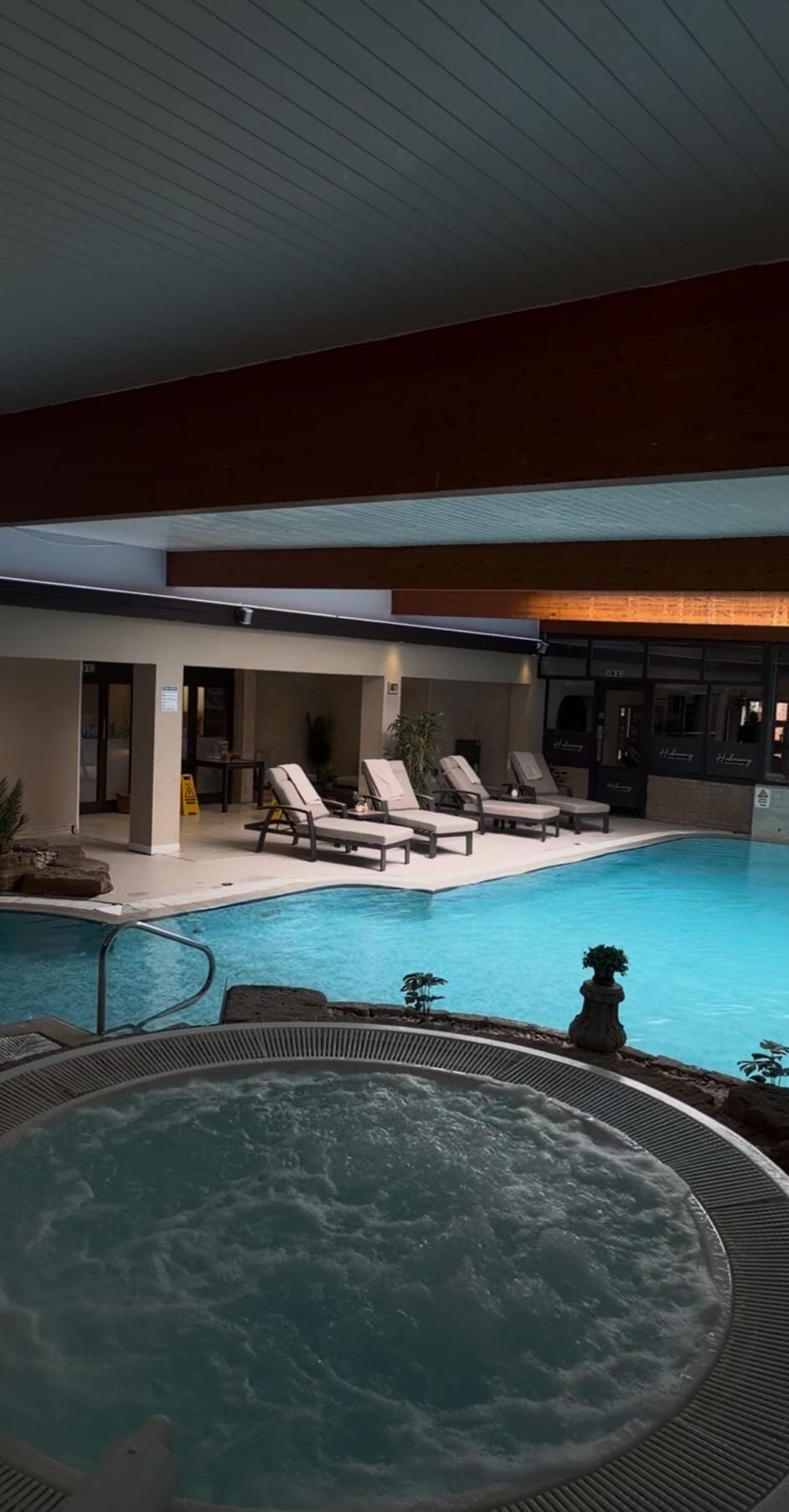 The pool at the Hideaway lit for the evening